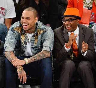 Game On - Chris Brown takes in a Boston Celtics vs. New York Knicks game at Madison Square Garden in New York City with Knicks super-fan and legendary filmmaker Spike Lee. (Photo: James Devaney/WireImage)