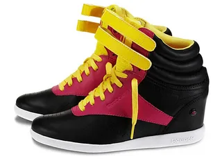 Freestyle Hi Wedge - Alicia Keys took the brand's Classic sneaker and gave it a stylish twist with a wedge heel and this bold color combo.&nbsp;  (Photo: Reebok)
