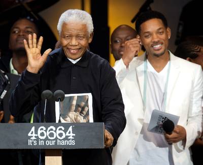 Happy Birthday to Him - In 2008, Will Smith joined him at the &quot;46664 - Give One Minute of Your Life to AIDS&quot; concert in London, part of his 90th birthday celebrations.&nbsp;(Photo: Mike Marsland/WireImage)