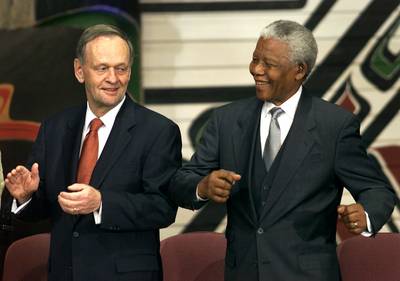 A Little Swing Music - In 2001, he bopped to the music with Canadian Prime Minister Jean Chretien during a ceremony to make Mandela an honorary Canadian citizen in Quebec.&nbsp;(Photo: REUTERS/Shaun Best JY/SV)