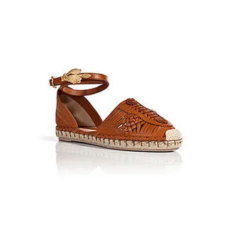 Valentino Leather Espadrilles  - Add luxe appeal to your relaxed bohemian getups with Valentino’s braided leather ankle-strap flats. (Photo: Courtesy of Stylebop.com)