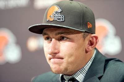 Manziel Will Have to Earn Browns Starting Job - If Johnny Manziel is going to be the Cleveland Browns starting quarterback for the 2014 season, he’s going to have to earn it in a competition with QB Brian Hoyer. That’s what his new teammates are telling Manziel. &quot;I think good old Johnny Football is going to be a good addition to Cleveland,&quot; Browns center Alex Mack told ESPN on Monday. &quot;Don't know who the starter is going to be, though.&quot; Monday also saw the Browns cut veteran quarterback Vince Young.(Photo: Jason Miller/Getty Images)