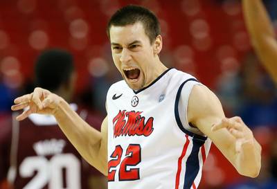 Ole Miss Player Explains Anti-Gay Michael Sam Tweets - It was all done in the name of science. Ole Miss basketball player Marshall Henderson revealed on Twitter today (May 12) that the bigoted comments he aimed at ESPN for airing a kiss between Michael Sam and his boyfriend were part of a psychology experiment. Henderson initially tweeted, “Boycotting sportscenter til this michael sam nasty ass s--- is off .... My brothers are 7 and 11 and saw that!!! #SICKENING.” After&nbsp; a lot of backlash Henderson announced, One of my best friends, WHO IS GAY, is about to graduate in psychology, asked me to say these things so he can have responses ... TBC.”(Photo: Kevin C. Cox/Getty Images)