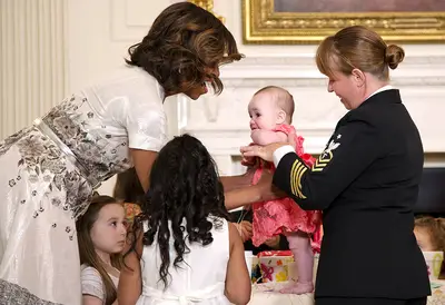 Kids Serve, Too - &quot;The thing that always strikes me about military kids is how much they sacrifice,&quot; the first lady observed.(Photo: AP Photo)
