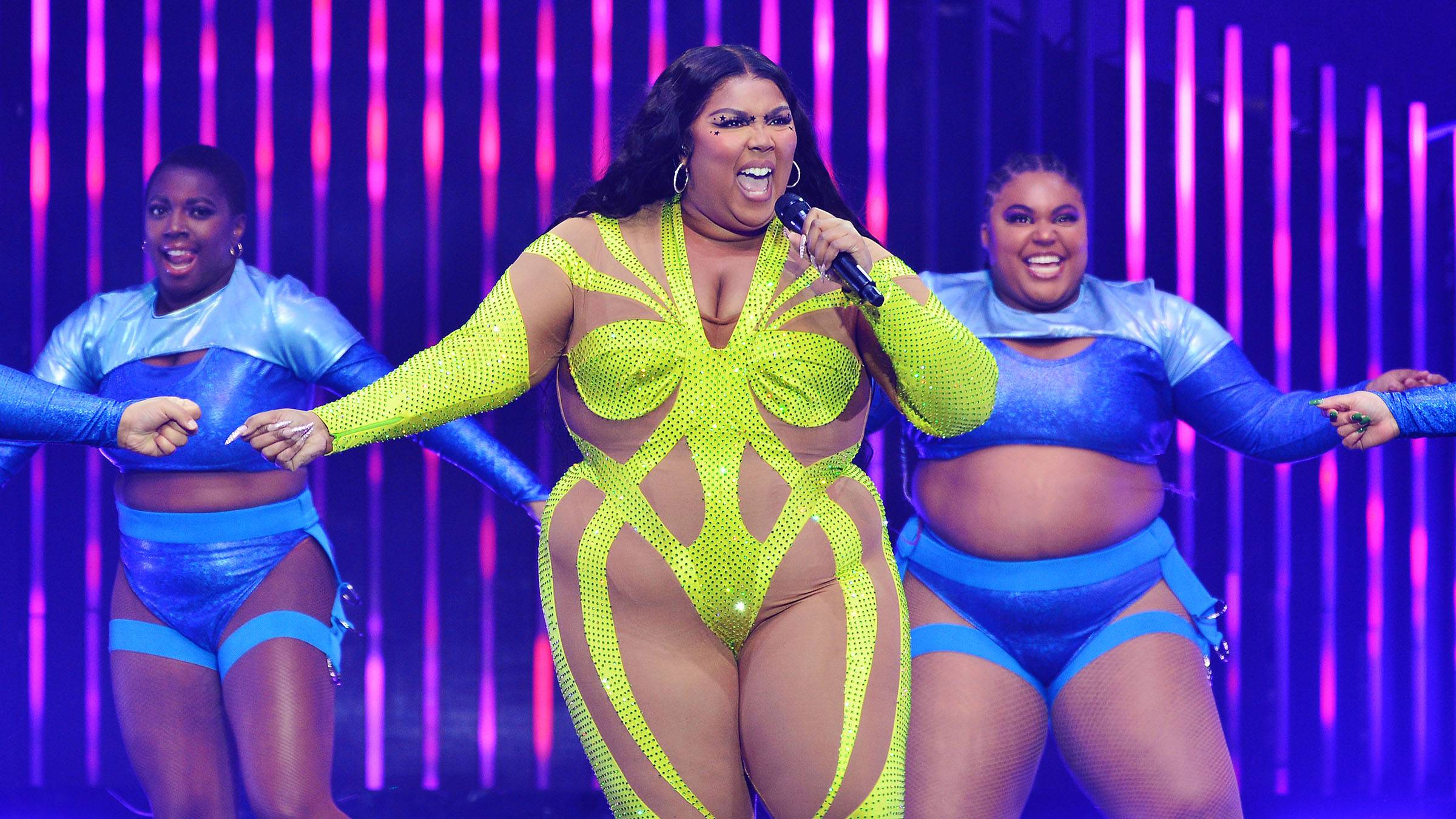Lizzo Joined Onstage by Flood of Drag Queens During Tenn. Concert Amid Gov  Lee's Anti-Drag Bill, News