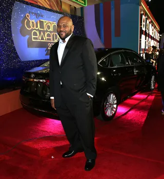 Ruben Studdard - The Biggest Loser star strikes a cool pose in front of the night’s soul ride for the night — Toyota. These hot wheels will pop up throughout this photo spread; the car company is sponsoring this red carpet rundown.  (Photo: Maury Phillips/BET/Getty Images for BET)