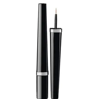 Ligne Graphique de Chanel Liquid Eyeliner - This liner’s fine-point tip makes it virtually foolproof to use. We’re loving the limited edition bronze hue for highlighting the inner corners of eyes or for a fresh take on the classic cat eye.  (Photo: Chanel Cosmetics)