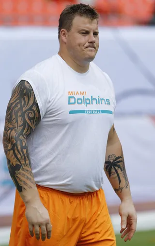 Richie Incognito to Remain Suspended With Pay - Richie Incognito has been suspended from the Miami Dolphins since Nov. 3 and according to a new agreement with the team he will remain suspended with pay for the rest of the season while the NFL continues to investigate former teammate Jonathan Martin’s bullying allegations. Incognito's suspension was scheduled to end following Sunday's game against New England.(Photo: Joel Auerbach/Getty Images)