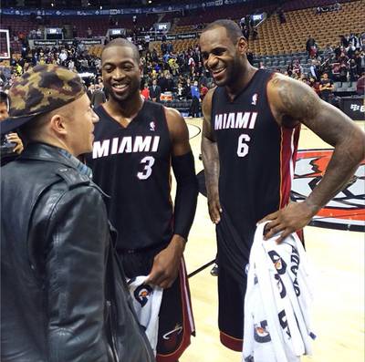 Macklemore @macklemore - Dwyane Wade and LeBron James are all smiles as they catch up with Macklemore after their win against the Toronto Raptors Tuesday.(Photo: Instagram via Macklemore)