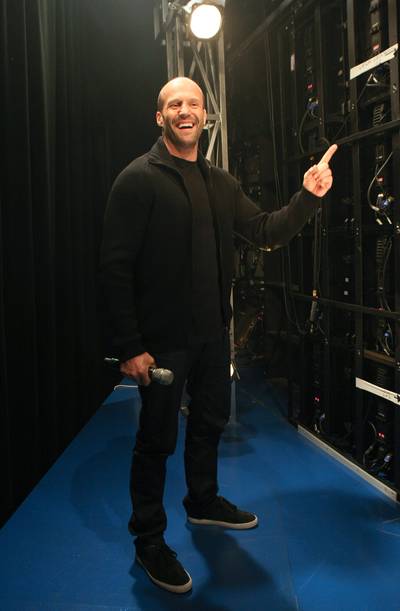 Cue Him - Actor Jason Statham right before he hits the 106 stage. (Photo: Bennett Raglin/Getty Images for BET)