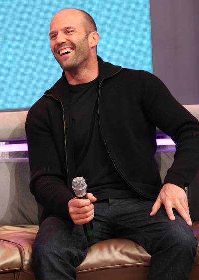 Smiling Face - Actor Jason Statham laughing with host Keshia Chant?. (Photo: Bennett Raglin/Getty Images for BET)