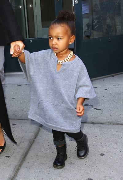 Big Chains, Big Thangs - For an outing in SoHo, New York, Nori mimics a style identical to her papa's. We're sure Saint West will want a chain just like big sis.(Photo: PacificCoastNews)