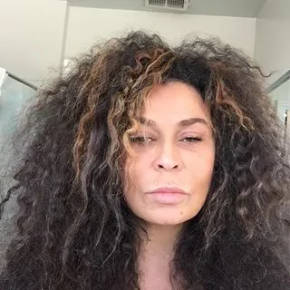 Tina Knowles Lawson @mstinalawson -  &quot;'I woke up like this...my curls from yesterday are replaced with frizz! Yikes&quot;  It's clear as day that Beyoncé gets her flawless face from her mama. We're loving the 61-year-old's wild locks and shining confidence.  (Photo: Tina Knowles via Instagram)