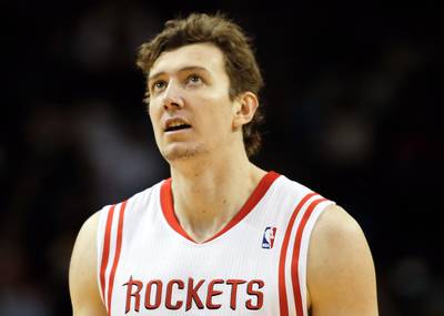 Rockets Trade Asik to Pelicans - The Houston Rockets have agreed to send 7-0 center Omer Asik and $1.5 million in cash to New Orleans in exchange for the Pelicans’ 2015 first-round Draft pick, ESPN is reporting. The move also sets up a potential trade of Rockets guard Jeremy Lin to put the franchise under the salary cap enough to pursue Carmelo Anthony and LeBron James.&nbsp;(Photo: Scott Halleran/Getty Images)