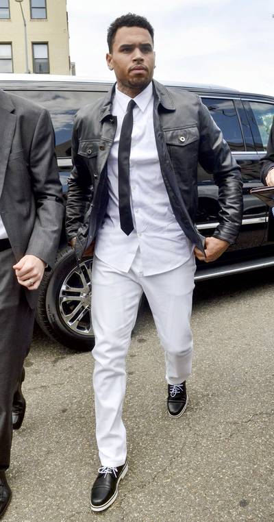 Courting the Streets - Chris Brown's&nbsp;court woes are far from over. The &quot;Loyal&quot; singer&nbsp;enters a courthouse where he is rejecting a plea deal for a 2013 assault charge in Washington, D.C. CB was arrested on misdemeanor charges after allegedly assaulting Parker Adams outside the W Hotel last year.(Photo: Kris Connor/Getty Images)