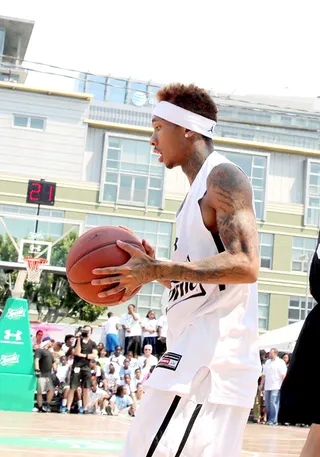 Flexing His B-Ball Skills – (June 2014) - Tyga was a part of last year's celebrity basketball game at BET Experience. He returns this year and is ready to tear up the court! (Photo: Johnny Nunez/WireImage)