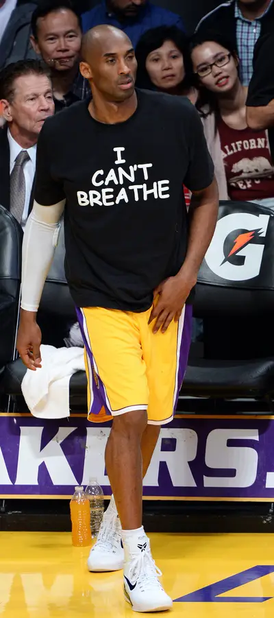 Kobe Bryant - Los Angeles Lakers superstar&nbsp;Kobe Bryant joined the movement, also wearing the &quot;I Can't Breathe&quot; T-shirt to honor Eric Garner before his squad took on the Sacramento Kings on Tuesday night. Afterwards, Bryant told ESPN:&nbsp;“I think it’s us supporting that movement and supporting each other as well as athletes.”(Photo: UPI/Jim Ruymen/LANDOV)