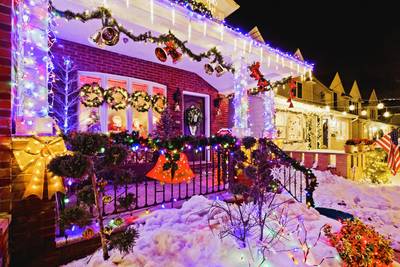 Lights - On the roof, on the tree — twinkling lights make everything look 100 percent more magical. Find cool local light displays near you at ChristmasLightFinder.com. It's a beautiful sight.&nbsp; (Photo:&nbsp;Rudy Sulgan/Corbis)