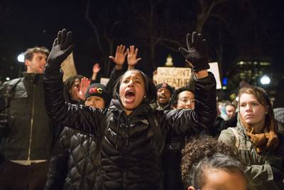 Don't Shoot - Protesters hold up their hands and chant &quot;hands up, don't shoot!&quot; in Boston, Massachusetts. &nbsp;(Photo: Scott Eisen/Getty Images)