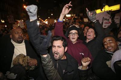 Fists in the Air - Protesters gather in the second day of protests in New York City.&nbsp;(Photo: AP Photo/John Minchillo)