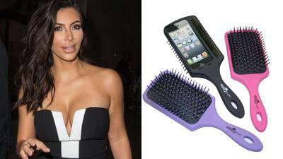 Kim Kardashian - 'Tis the season to stuff stockings, and we're playing Santa to some of our favorite stars — regardless of whether they've been naughty or nice. Our list of Christmas gifts we'd buy celebs starts with a &quot;selfie brush&quot; for the Queen of Selfies, Kim Kardashian. This handy iPhone case comes with a hairbrush for those quick touch-ups before you turn the camera on yourself.  (Photos from left: Mario Mitsis/WENN.com, Amazon via Twittter)