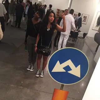 Angela Simmons - #SelfieGameStrong! Angie and a pal get some direction with the help of an exhibit while touring the galleries.&nbsp; (Photo: Angela Simmons via Instagram)