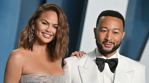 Chrissy Teigen and John Legend attend the 2022 Vanity Fair Oscar Party hosted by Radhika Jones at Wallis Annenberg Center for the Performing Arts on March 27, 2022 in Beverly Hills, California.