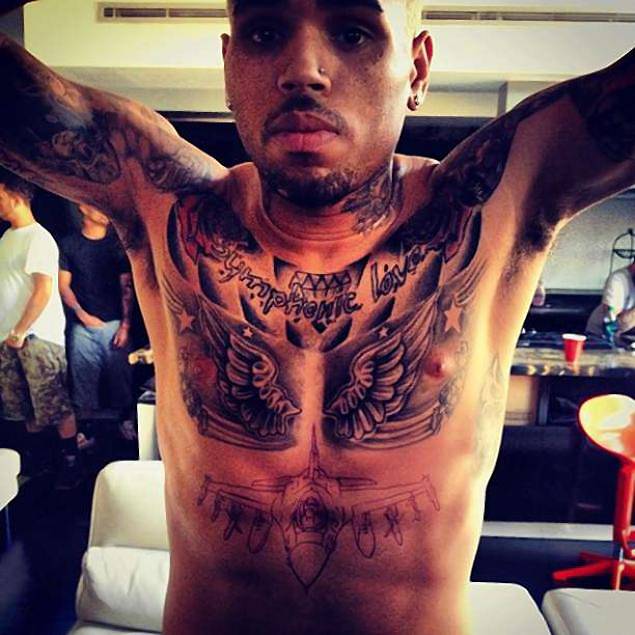 Shared Tattoo - Rihanna - Image 6 from A Guide to Chris Brown's Tattoos |  BET