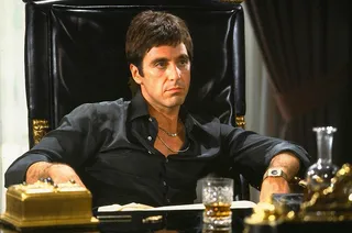 Al Pacino in Scarface - Leave it to Pacino, an actor who built a career playing bad guys, to make a villain seem actually likeable. As Tony Montana, a Cuban refugee with his own, twisted way of achieving the American dream, Pacino rocks a three-piece suit and chains like few we've ever seen.&nbsp;  (Photo: Universal Pictures)