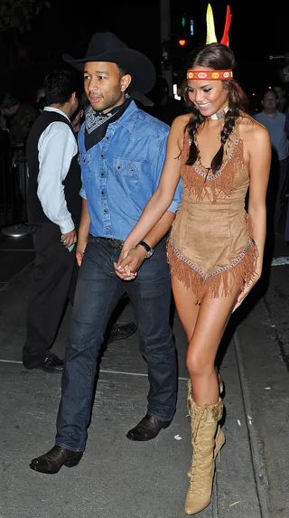 Chrissy Teigen and John Legend - Chrissy Teigen and John Legend get team effort points here. What a good looking couple. His cowboy costume is pretty easy to recreate and we're sure you can find an Indian princess getup at your local Halloween costume store.  (Photo: WENN)
