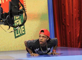 Boot Camp - Bow Wow joins the push up battle with some support (or is in hindrance?) from Paigion at 106 &amp; Park, October 11, 2012. (Photo: John Ricard / BET)