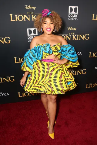 Courtney Quinn - Social media influencer&nbsp;Courtney Quinn&nbsp;stuck to her colorful signature with a bright African-print dress.(Photo: Jesse Grant/Getty Images for Disney)