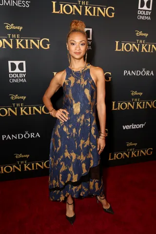 Syndee Winters - Music artist&nbsp;Syndee Winters attended the movie's premiere wearing a beautiful blue-and-gold dress.(Photo: Jesse Grant/Getty Images for Disney)