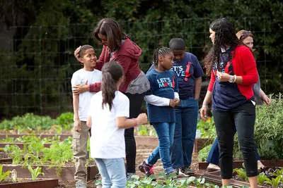 A Cause for Celebration - First Lady Michelle Obama&nbsp;participated in the seventh planting of the White House kitchen garden on April 15 with the help of a group of school children from around the nation. This year there was an extra reason to celebrate besides the anticipation of delicious summer veggies. &quot;This is an important planting because this is the fifth birthday of Let's Move!, and we're celebrating,&quot; the first lady said. &quot;And we are doing it by having representatives from all of the Let's Move! initiatives throughout the country as a real reflection of how many kids and how many families are being impacted.&quot;(Photo: Cheriss May)