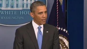 New, Obama Takes Reporters' Questions