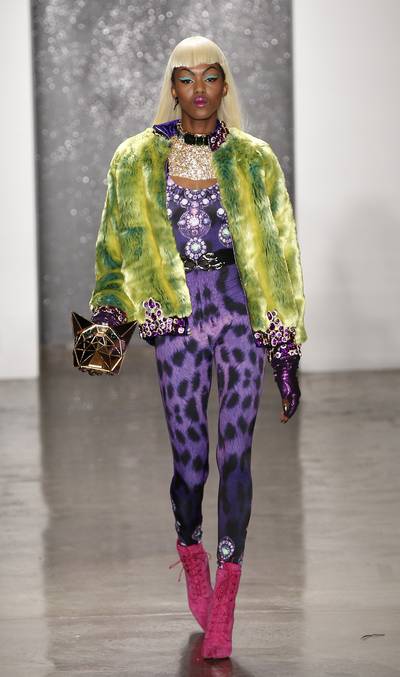 The Blonds - Yes, this is a whole lot of look. But fashion is all about having fun, and nothing screams “I’m fabulous” like a furry, lime green coat and bejweled leopard catsuit. Meow!  (Photo: Joe Kohen/Getty Images)