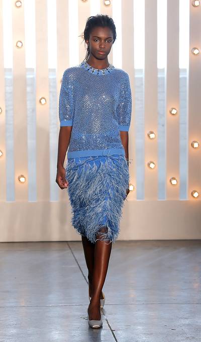 Jenny Packham - It’s official, we’re in love with Packman’s feathered details and shimmering blue hues, a clear twist on the richer shades of fall. (Photo: Jemal Countess/Getty Images for TRESemme)