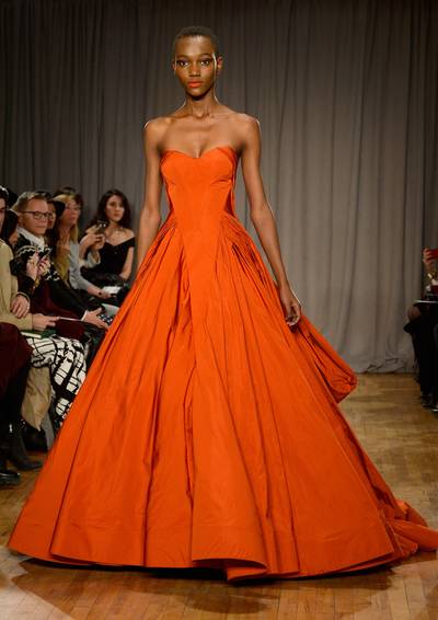 Zac Posen - Romantic. Grand. Stunning. We could go on and on about this sweeping orange ball gown. It's breathtaking.  (Photo: Frazer Harrison/Getty Images for Mercedes-Benz Fashion Week)