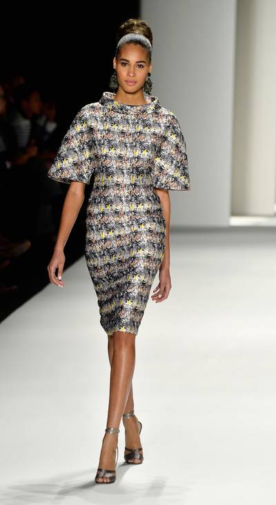 Carolina Herrera - After spying this simple yet stunning cowl neck frock, we’re ready to give Herrera the title of Queen of Classic Elegance. Every piece from her fall collection inspires us to step up our game a little more each day.  (Photo: Frazer Harrison/Getty Images for Mercedes-Benz Fashion Week)