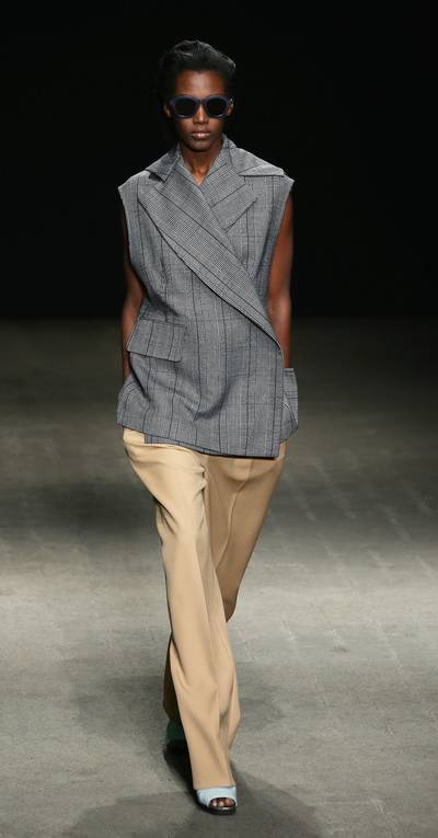 3.1 Phillip Lim - It feels like Lim was aiming to blend the best parts of masculine and feminine elements, pairing a boxy, 80s-inspired sleeveless jacket with breezy, cream trousers. We think he succeeded.&nbsp; (Photo: Neilson Barnard/Getty Images for Mercedes-Benz Fashion Week)
