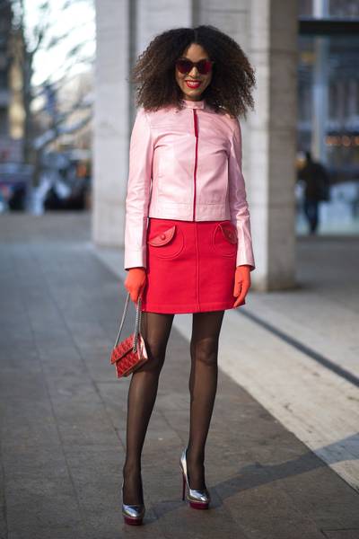 Ndoema - How great does the fashion blogger look in her baby pink motorcycle jacket and candy apple red skirt? This woman clearly knows how to have fun with fashion, adding her quirky red frames for even more pizzazz. (Photo: Timur Emek/Getty Images)
