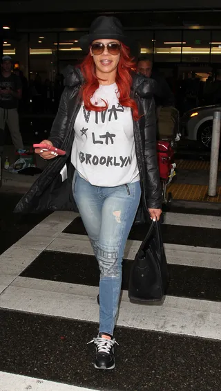 Flight Style - Faith Evans kept it casual and cute while she arrived for her flight to LA.(Photo: WENN.com)