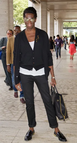 Runway Ready - Runway coach J. Alexander is ready for his closeup in an all-black ensemble punctuated with gold-heeled loafers and a luxe bag. Work!  (Photo: Alberto Reyes/WENN.com)