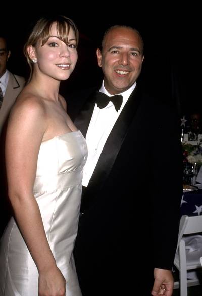 Mariah Carey and Tommy Mottola - In the late '80s&nbsp;Mariah Carey&nbsp;handed her demo to the&nbsp;head of Columbia Records, Tommy Mottola, who tracked her down immediately for a deal. By her third album, they were married — and by her sixth, they were separating. She remained signed to the label, as per her contract, through her seventh, Rainbow.(Photo: Ron Galella/WireImage/Getty Images)