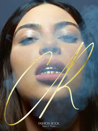 Kim Kardashian on CR Fashion Book - The reality TV star is currently gracing the cover of CR Fashion Book's third issue and Kim gives us her wildest photo shoot yet with gold grills and haute couture.   (Photo: CR Fashion Book, Issue 3)