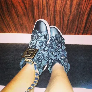 Killer Kicks - Who would have imagined 3D leather flowers decorated over a pair of high tops would look so stunning. #shoegasm  (Photo: Rihanna via Instagram)