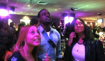 Lance Gross and Team - Gross checks the scoreboard with his teammates. This is the House of Payne star's second year attending the charity event.  (Photo: Rhonda Cowan)