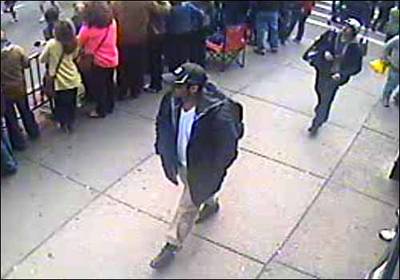 FBI Releases Images of Suspects - On April 18, 2013, the FBI releases surveillance video and images of the alleged suspects wanted in connection with the bombings. One of the alleged suspects is seen carrying a black backpack believed to be used to conceal one of the bombs.&nbsp;(Photo: FBI)