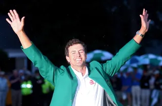 King of the Green - Golfer Adam Scott earned his first green jacket after winning the Masters last week. The 32-year-old made history as the first Australian to win in the tournament's history.&nbsp;(Photo: Mike Ehrmann/Getty Images)