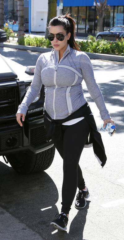 Work It Out - Kim Kardashian is vigilant about staying fit during her pregnancy. Here, the reality star is spotted again heading into the Tracy Anderson gym in Los Angeles. (Photo:&nbsp; Devone Byrd, PacificCoastNews.com)